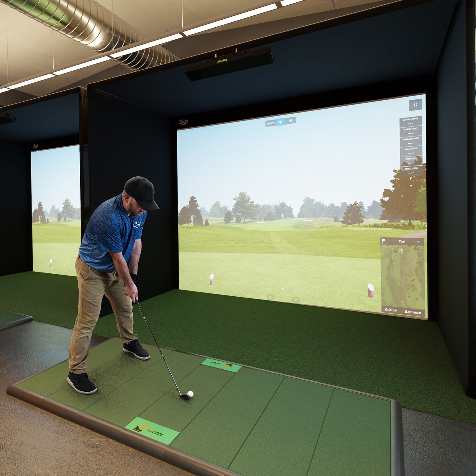 diy golf simulator enclosure golfer teeing up side angle