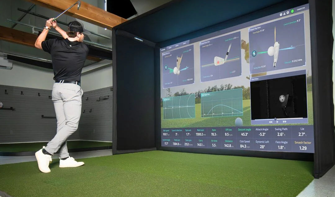 best virtual golf simulator man hitting action shot