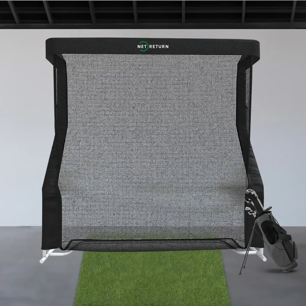indoor golf net with clubs and mat front on view